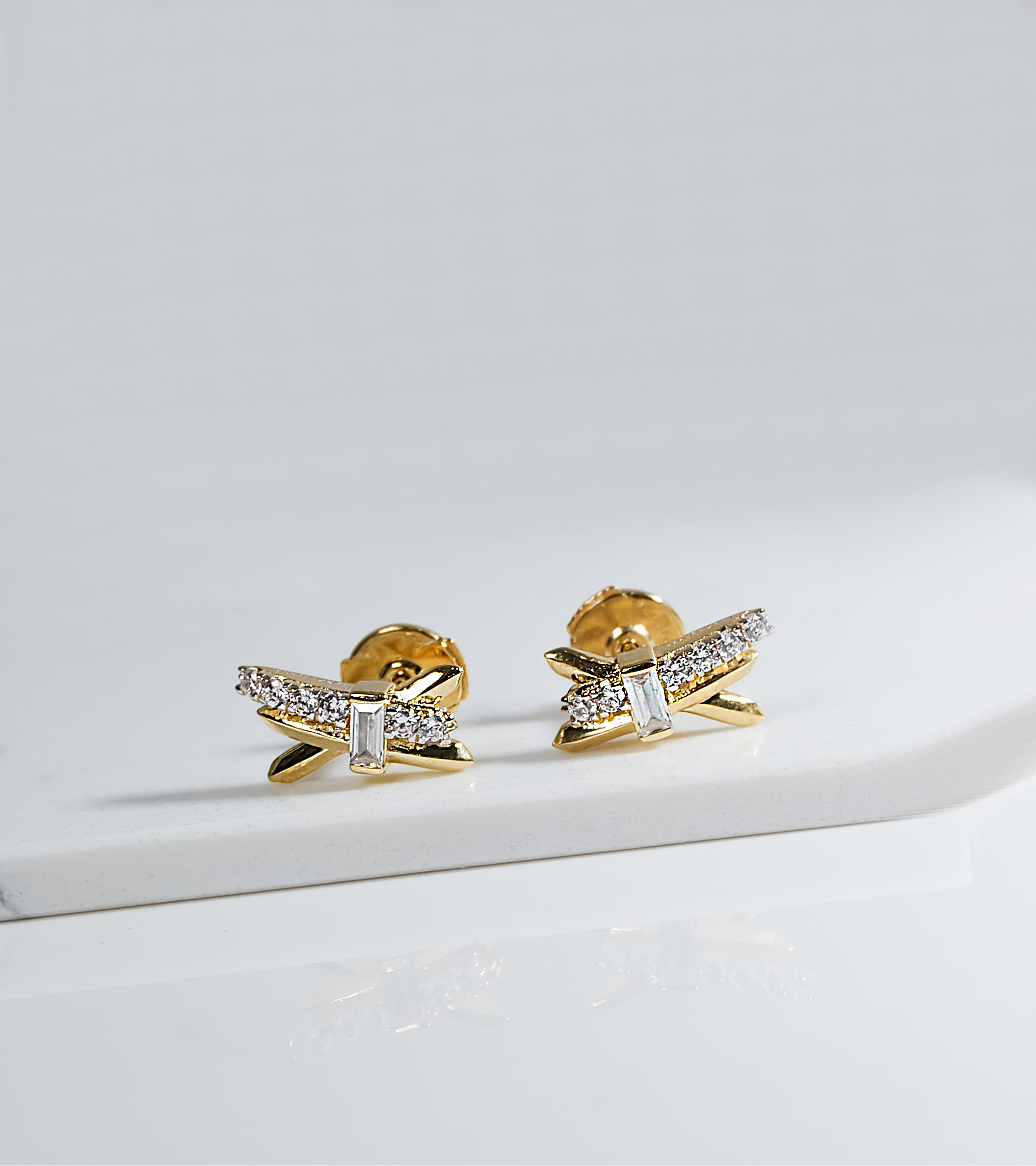 Radiant Cross Gold Studs