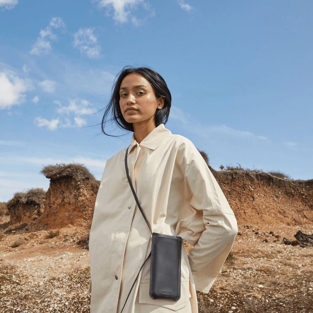 Elia Vegan Phone Bag in Black Onyx on model as a crossbody sling