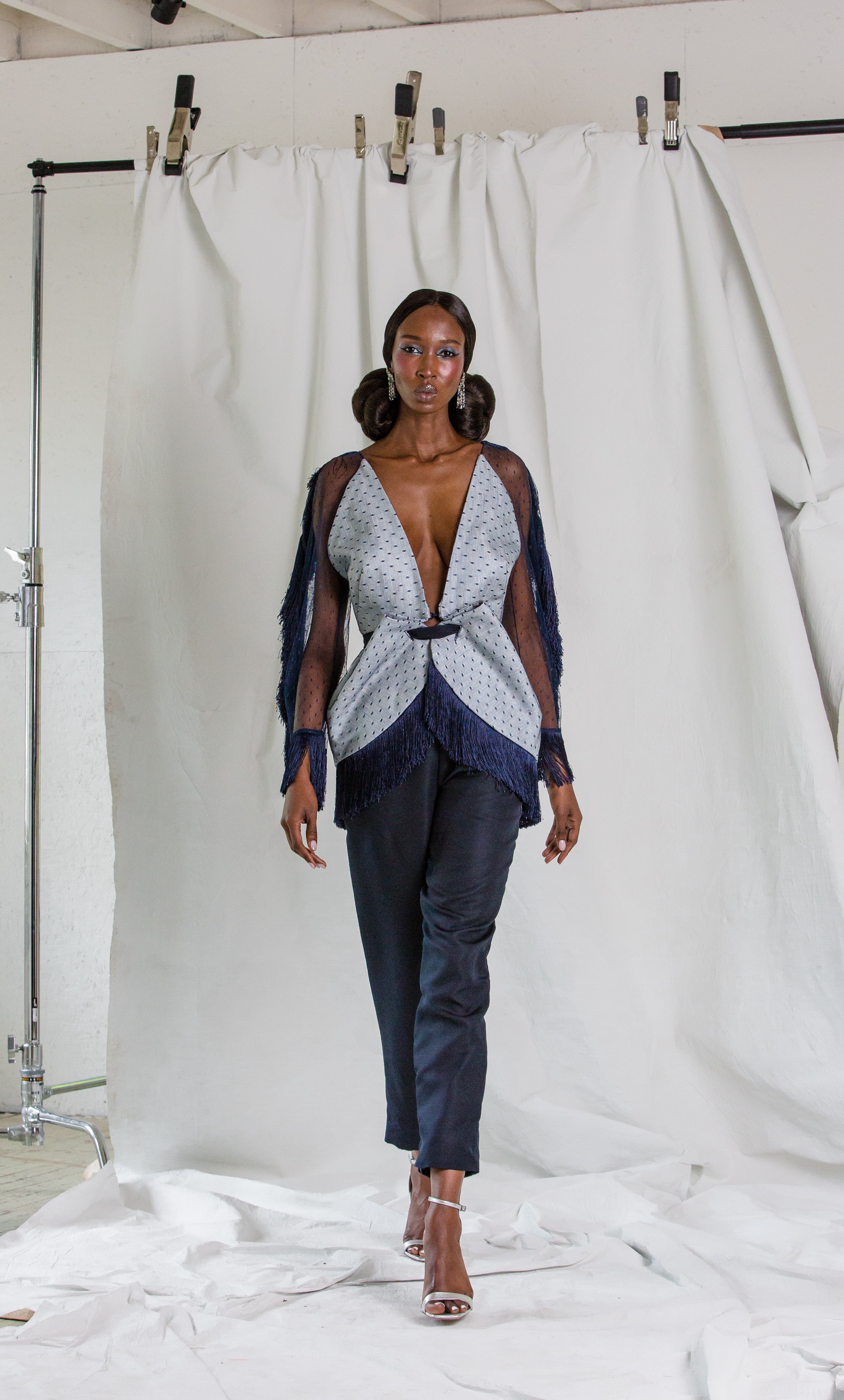 Speckled Ivory and Blue Wool with Tulle Overlay Draped Blazer with Sheer Fringe Sleeves & Navy Silk Faille Smoking Trouser & Silk Faille Belt | Wool & Tulle Blazer and Silk Faille Trouser | Fall/Winter 2021 | CELESTINO