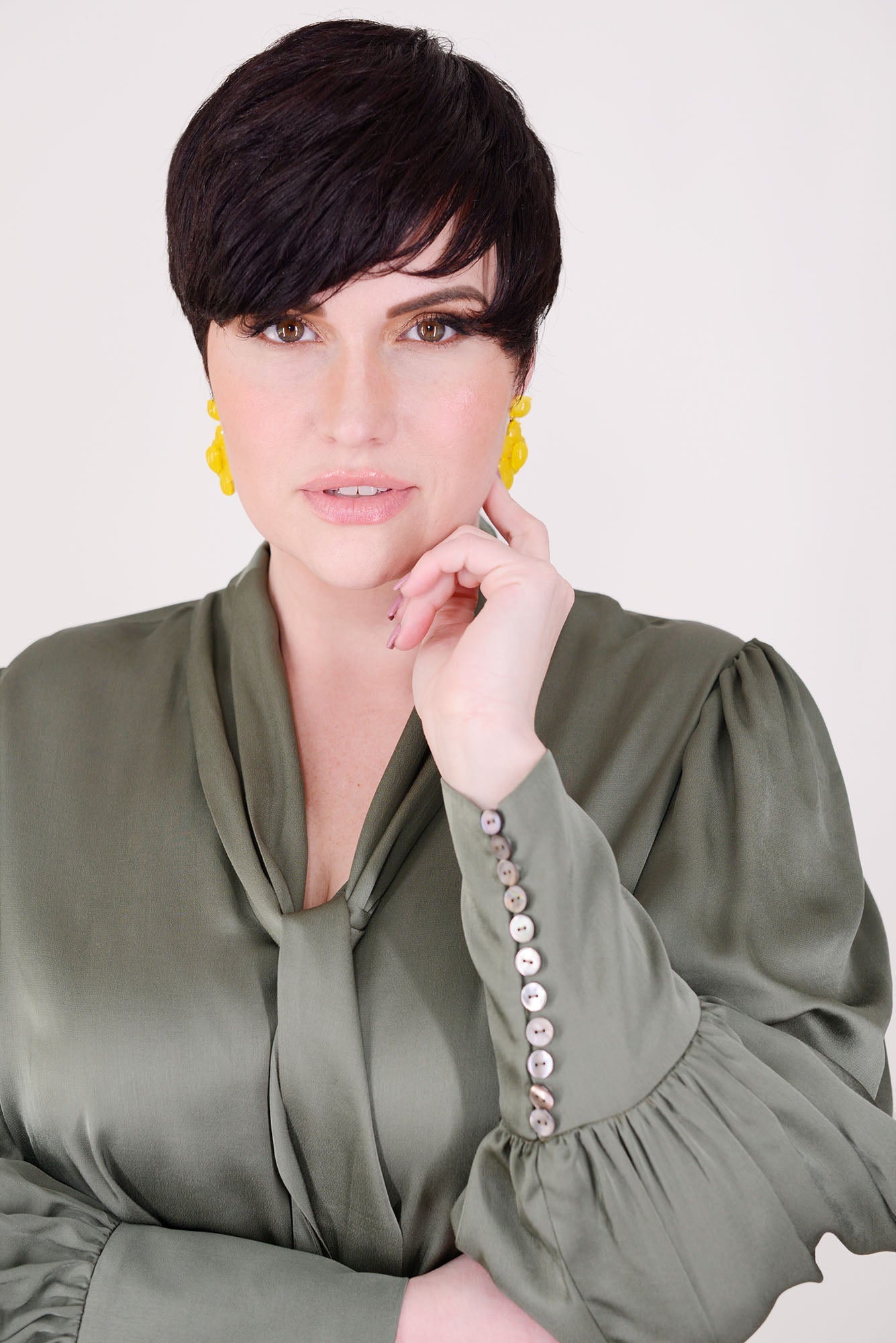 Mayes NYC Mia Scarf Neck Blouse in Solid color Olive worn by model Max