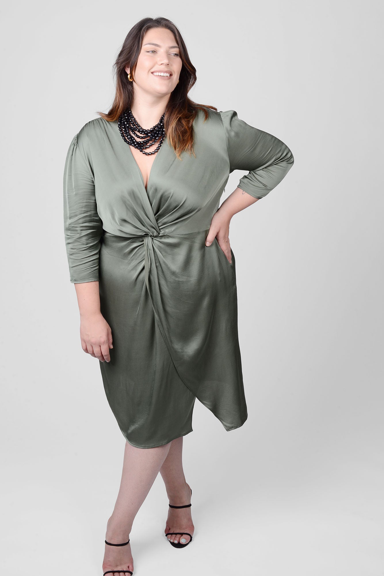 Mayes NYC Elvie Knot Waist Cut Away Dress in Olice color worn by model Megan Smith