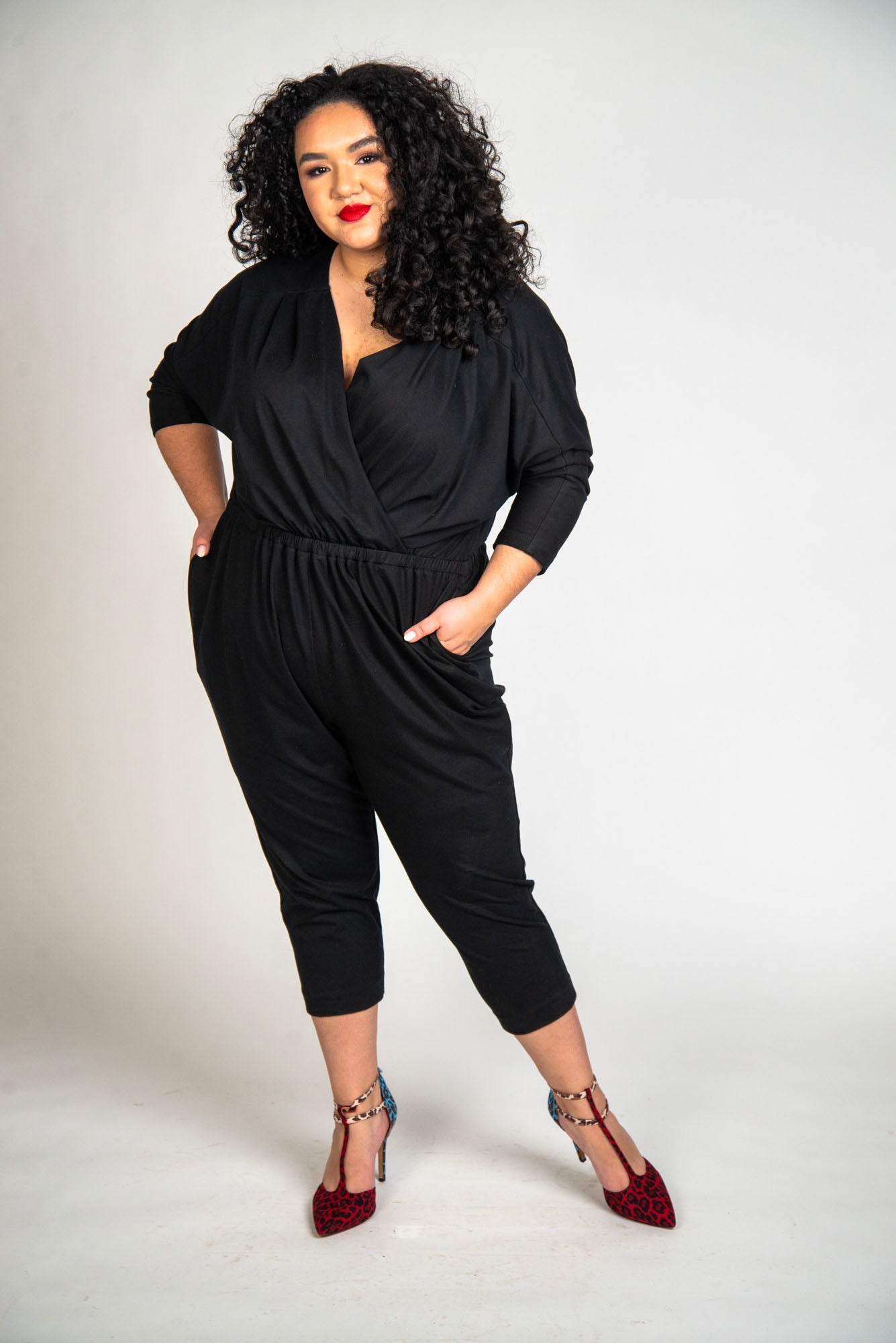 Mayes NYC Alex Back to Front Reversible Jumpsuit Solid color black worn by model Grace Delgado