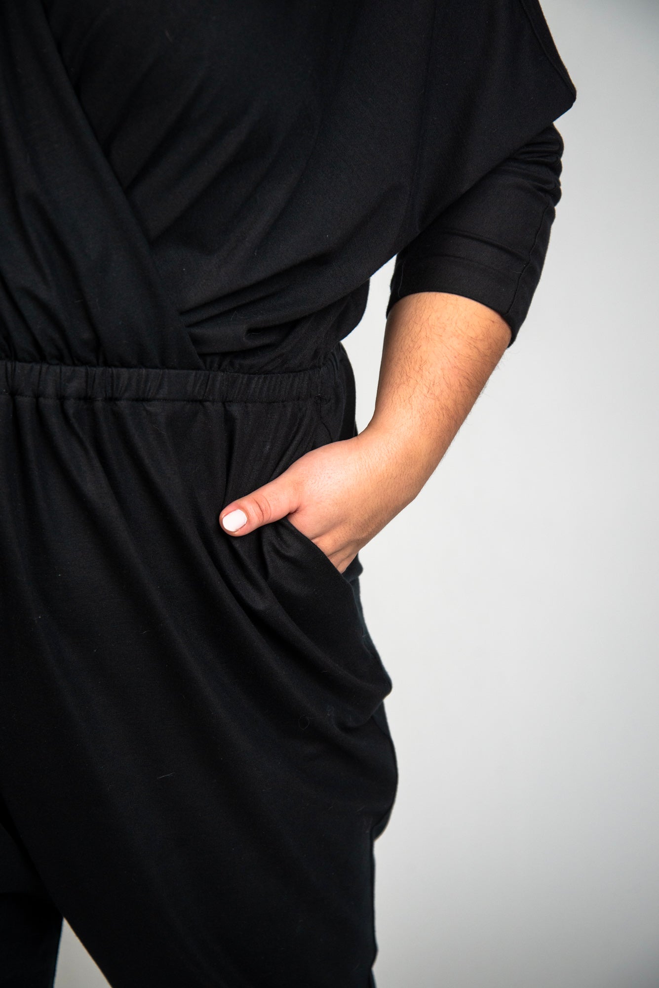 Mayes NYC Alex Back to Front Reversible Jumpsuit Solid color black worn by model Grace Delgado
