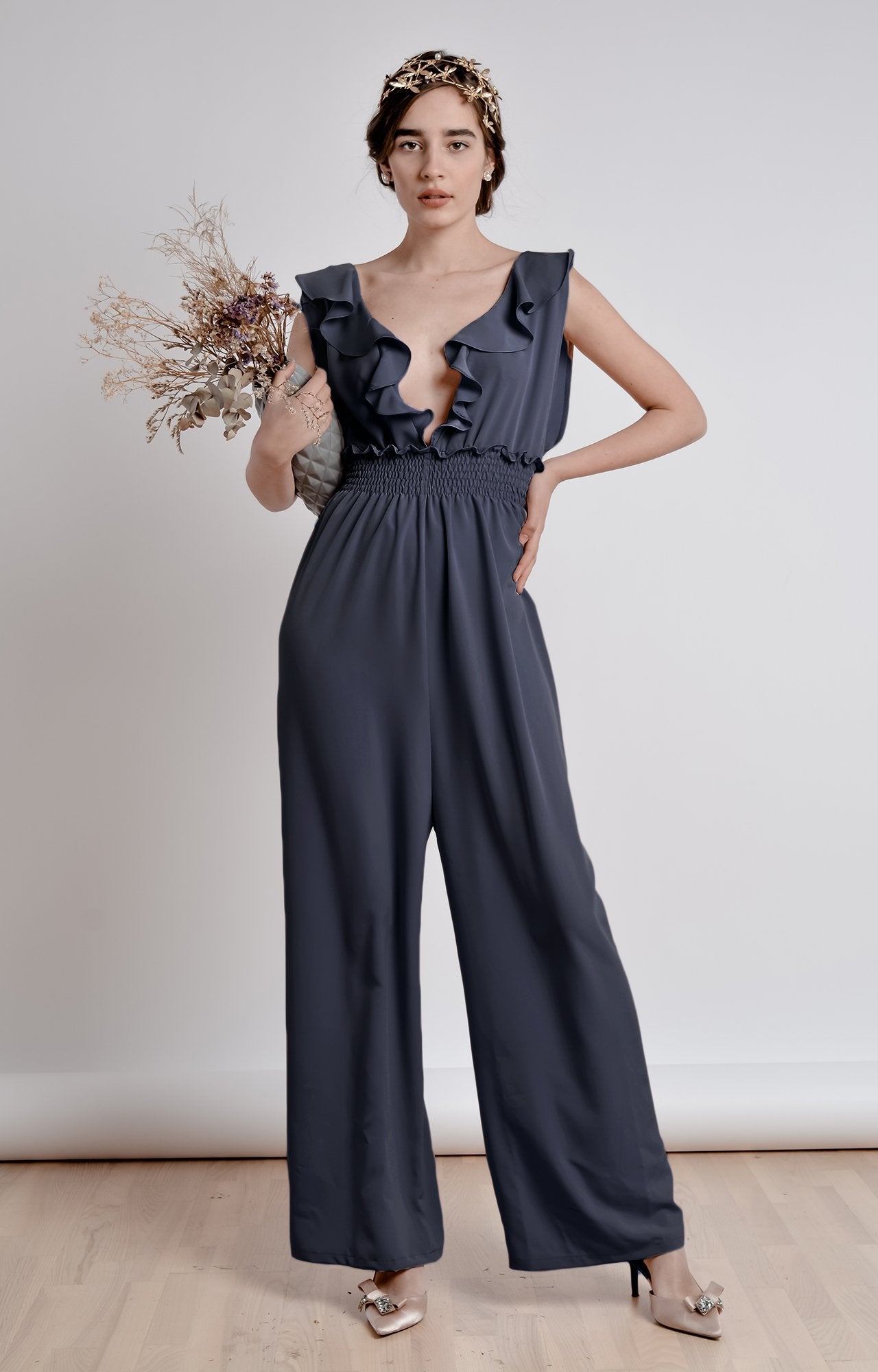 Midnight blue wide leg, sleeveless jumpsuit with ruffle and smocking details
