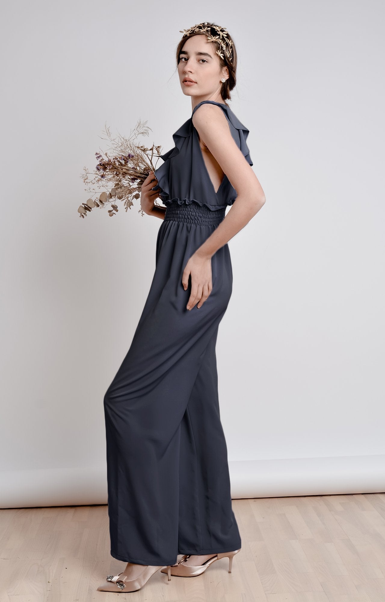 Midnight blue wide leg, sleeveless jumpsuit with ruffle and smocking details