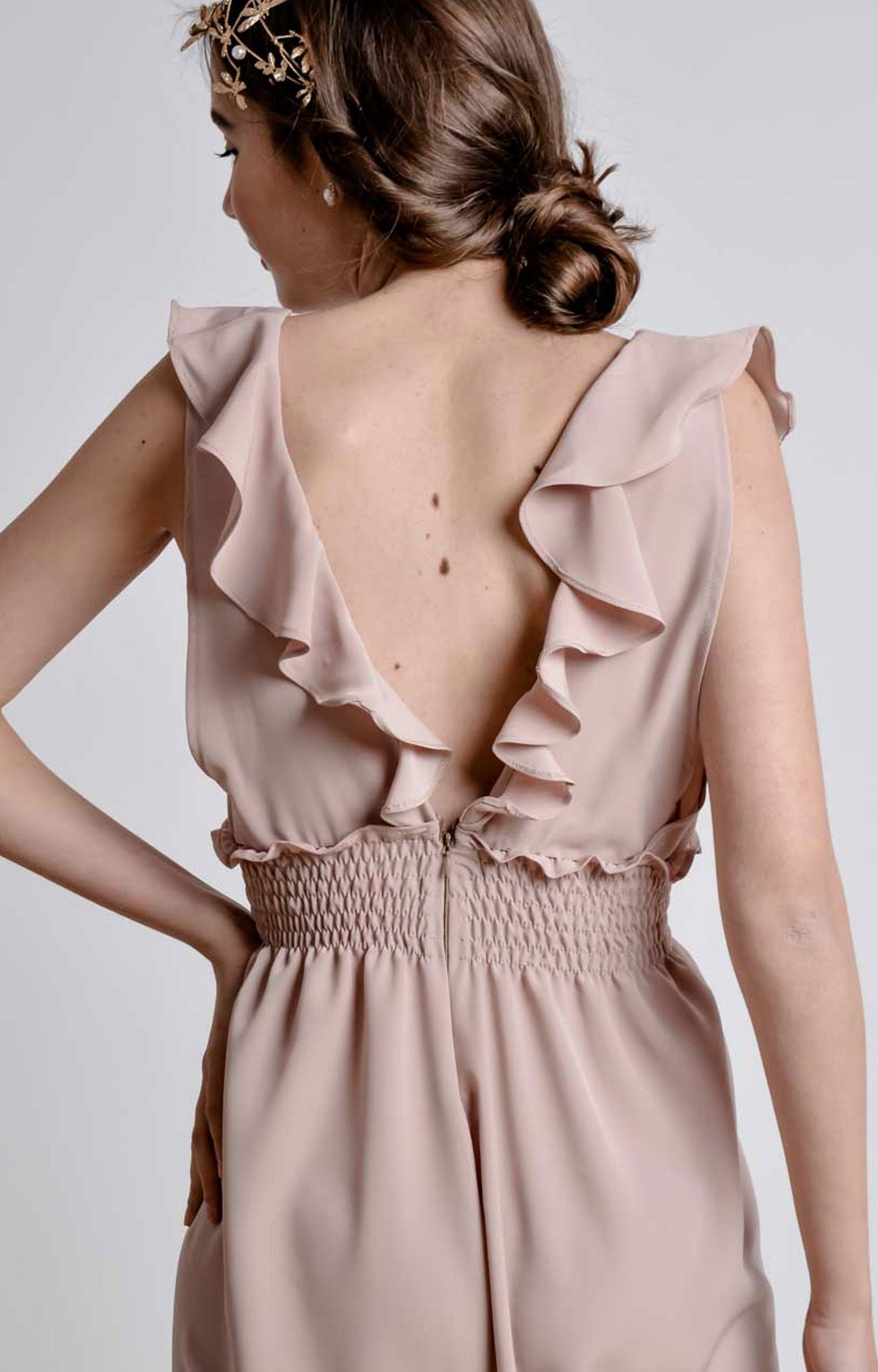 Salmon pink wide leg, sleeveless jumpsuit with ruffle and smocking details