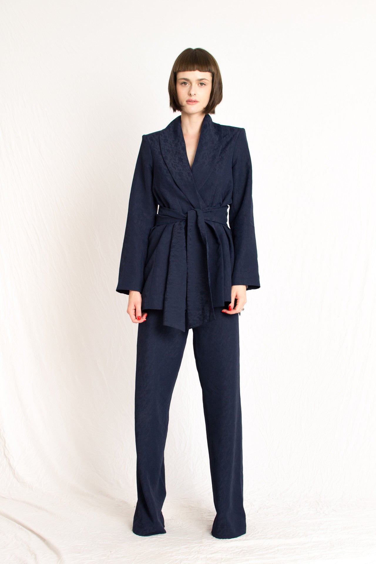 navy blue patterned relaxed fit blazer with wrap around belt