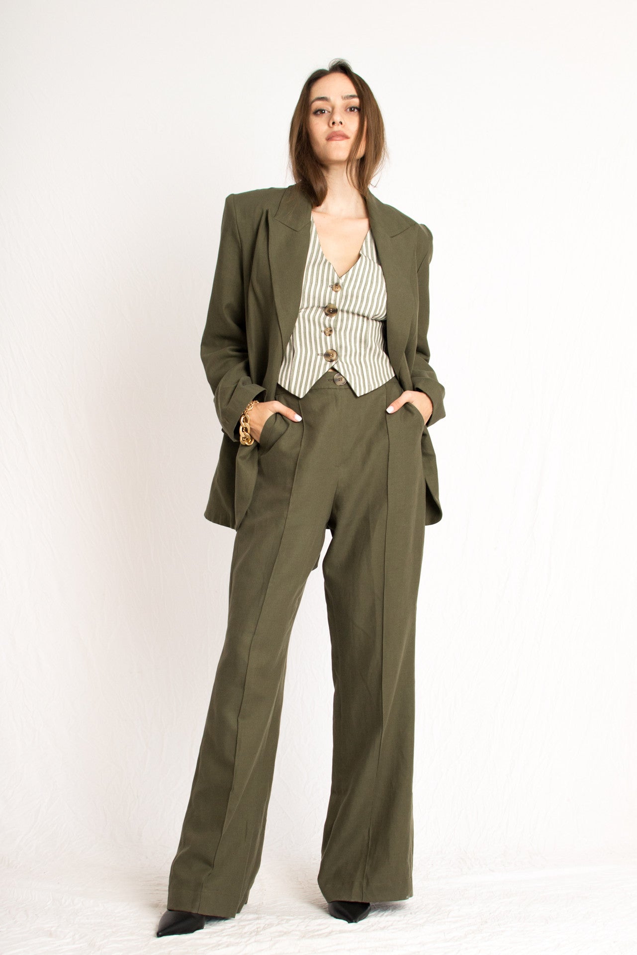 olive green blazer with front button and two pockets