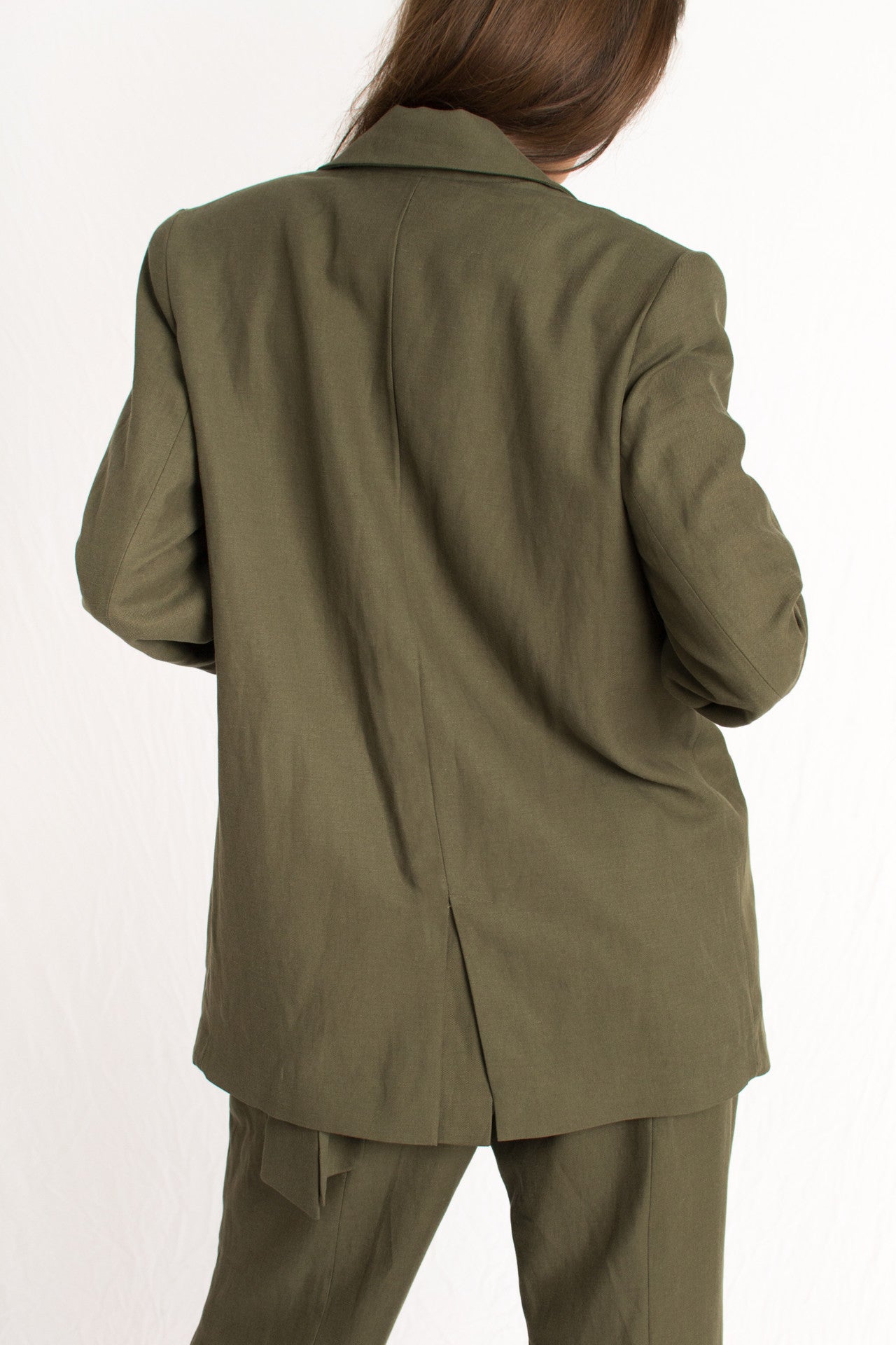 olive green blazer with front button and two pockets