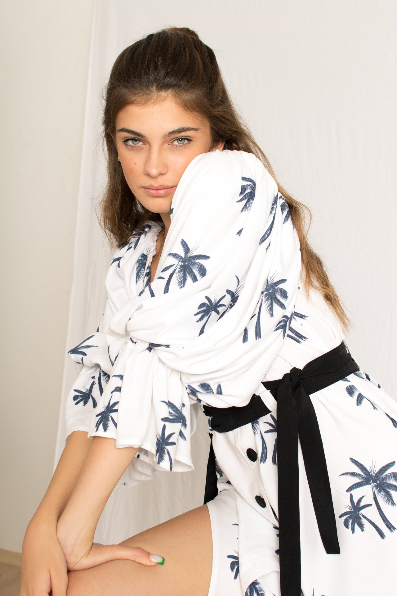 white midi palm tree print dress with side slits and peasant sleeves