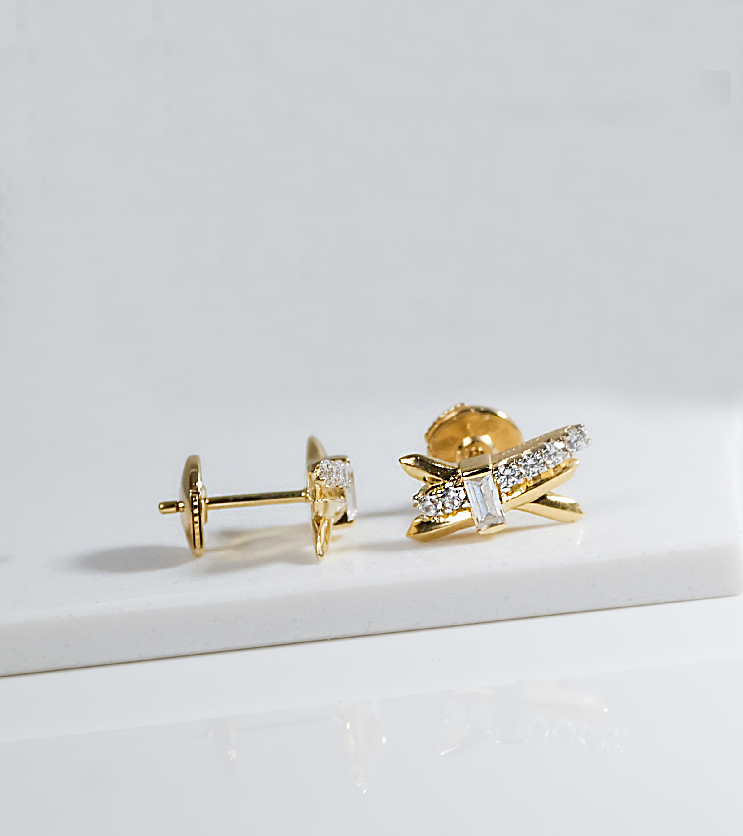 Radiant Cross Gold Studs