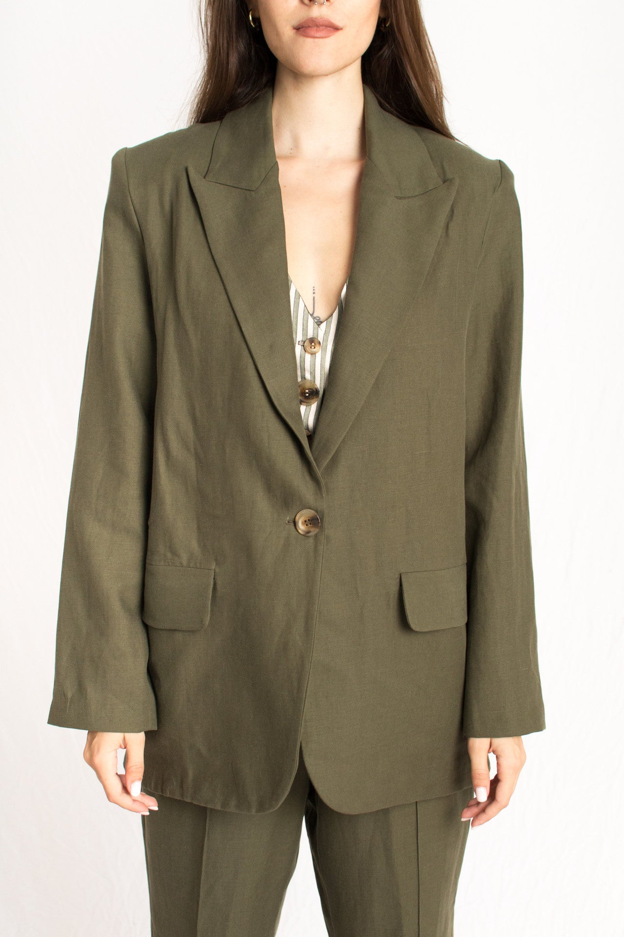 olive green blazer with front button and two pockets
